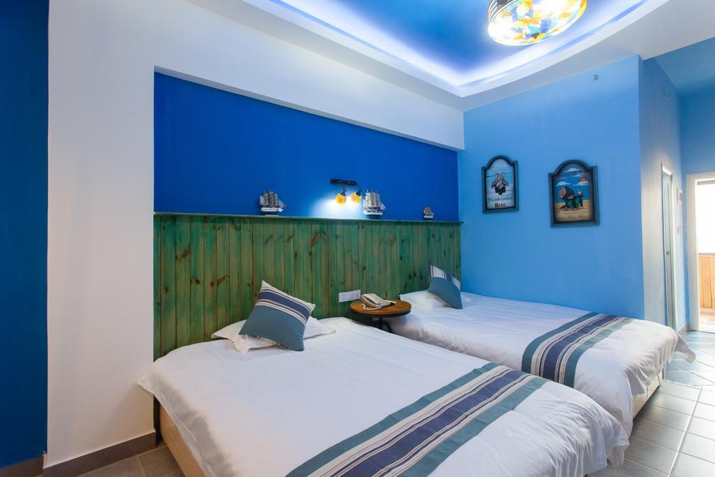 Haikou Time Inn Theme Hotel Zimmer foto